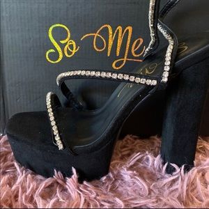 Black suede platform heels with rhinestone straps